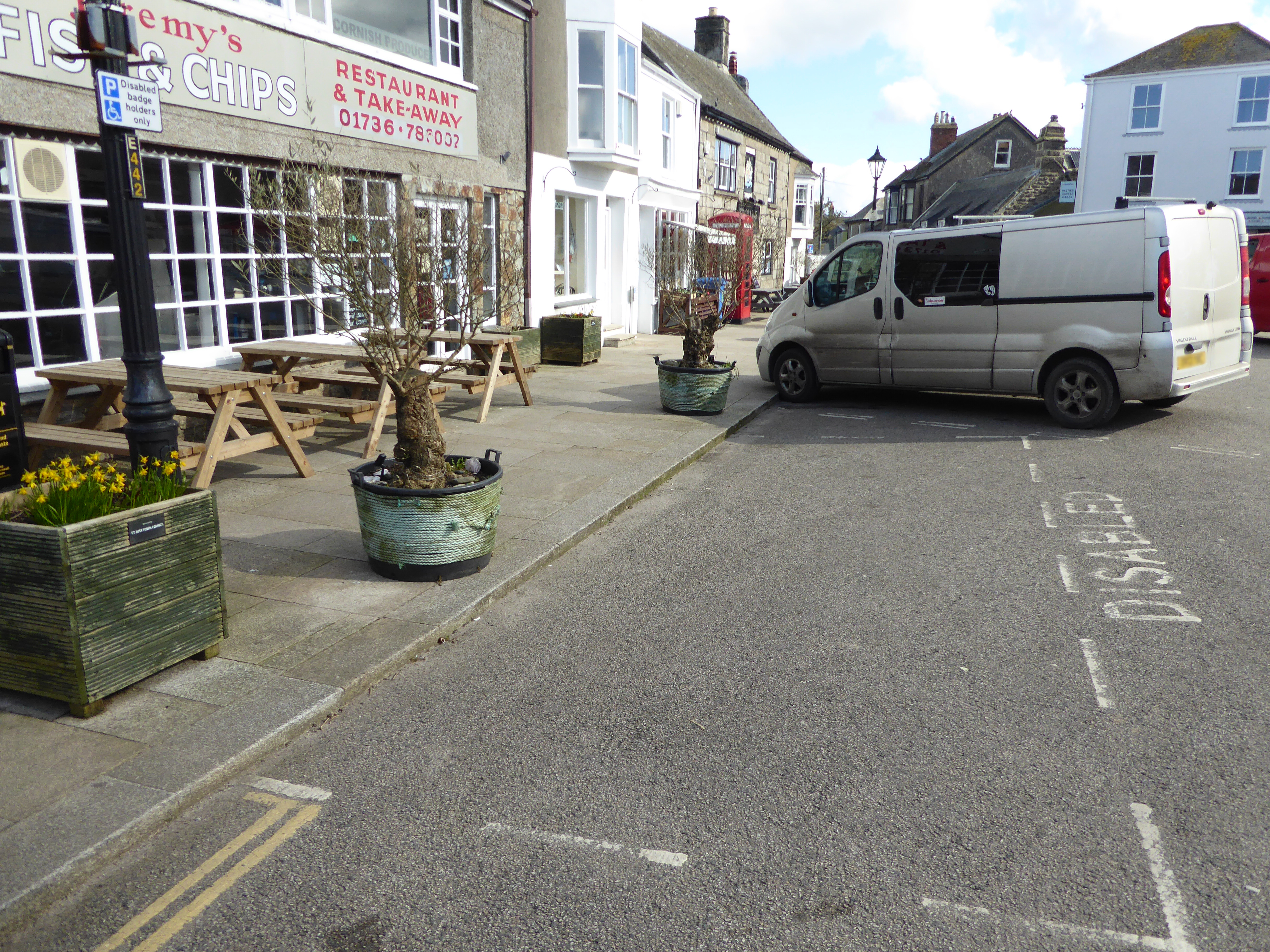 There is a single Disabled parking space in the town centre on Market Square.